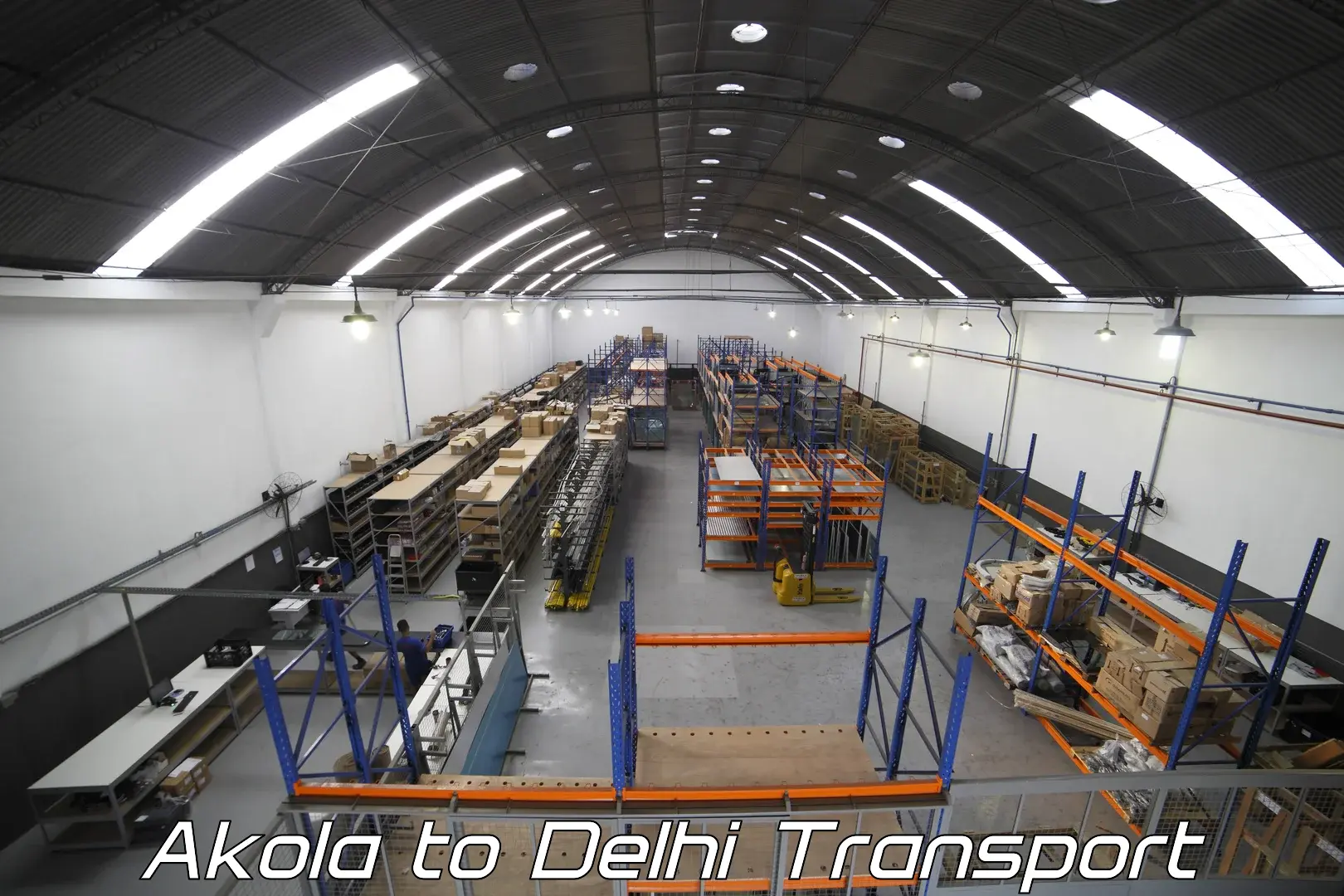 Air cargo transport services Akola to Naraina Industrial Estate