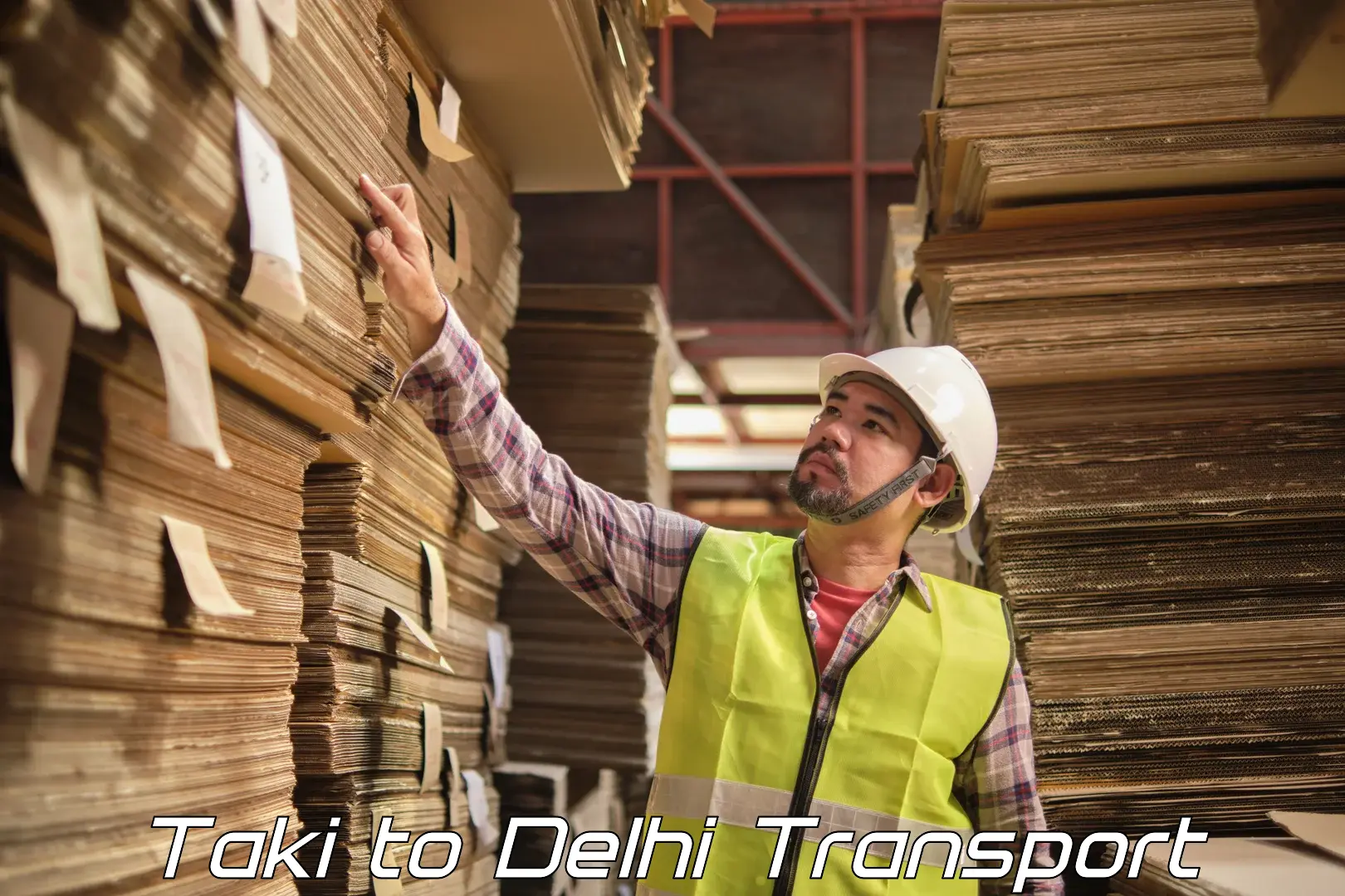 Scooty parcel Taki to Delhi